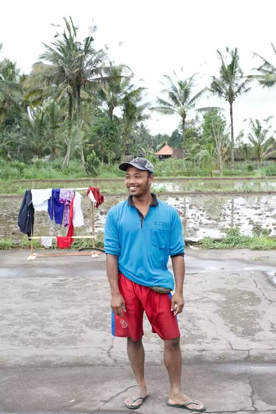 portrait of a balinese rice farmer near mount agung